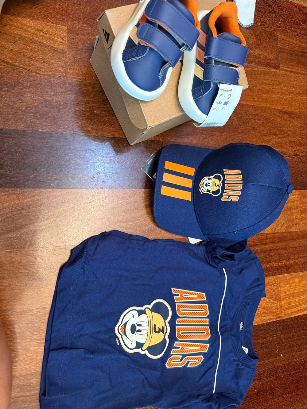adidas Navy Blue Tee with Orange Mickey Graphic and Matching Cap and sneakers